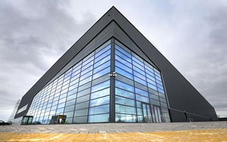 A large modern building with glass windows